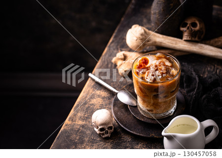 Halloween coffee with ice in shape of skull Halloween coffee with ice in shape of skull 130457058