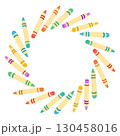 Colorful crayons arranged in a circular wreath-like shape on white background 130458016