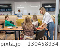 Office Teamwork Whiteboard: Women collaborate during daytime meeting, brainstorm ideas for business growth. 130458934