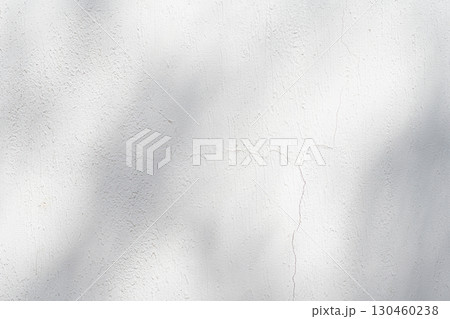 Wall with texture and shadows. Grey concrete background 130460238