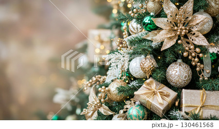 Luxurious Christmas tree decorated with golden, green, and white ornaments and gifts. Festive background. 130461568