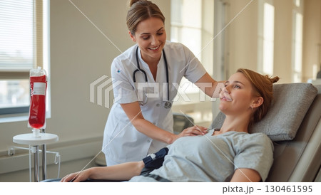 Compassionate nurse assists blood donor in bright sunlit medical donation facility Compassionate nurse assists blood donor in bright sunlit medical donation facility 130461595