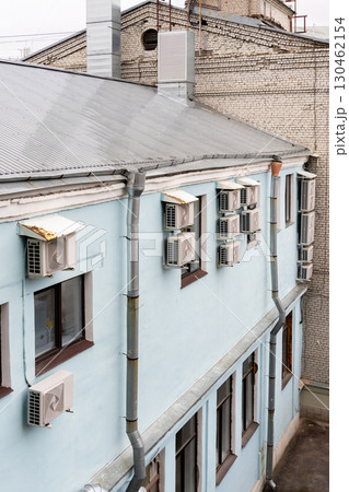 air conditioners are installed on the wall of the building. cooling in hot weather. air conditioners are installed on the wall of the building. cooling in hot weather. 130462154