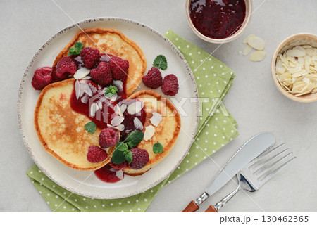 Homemade pancakes with yoghurt and fresh raspberry 130462365