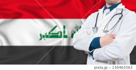 Iraq healthcare concept. Male doctor on Iraq flag. Doctor with crossed arms on Iraq flag 130463563