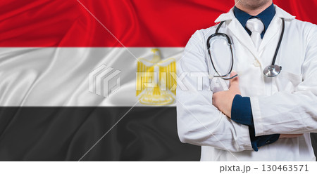 Male doctor with stethoscope on Egypt flag. Doctor holding stethoscope on Egypt flag 130463571