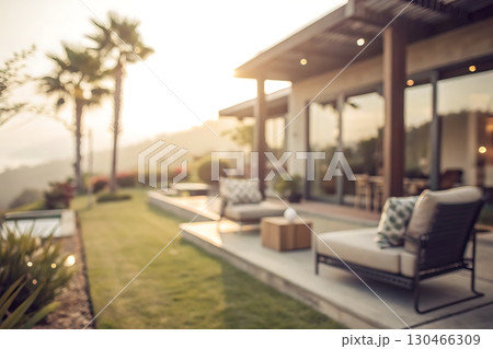 Serene Modern Outdoor Living Space with Stylish Furniture and Scenic Mountain View at Sunset Serene Modern Outdoor Living Space with Stylish Furniture and Scenic Mountain View at Sunset 130466309