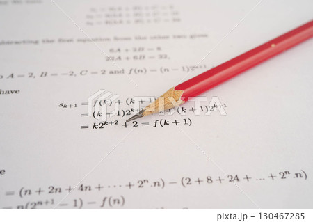 Pencil on mathematic formula exercise test paper in education school. Pencil on mathematic formula exercise test paper in education school. 130467285