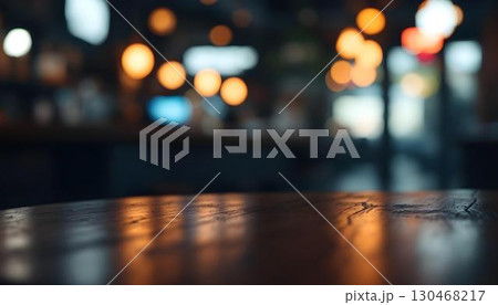 An empty product display table set in a cafe, with soft bokeh lights in the background enhancing the ambiance 130468217