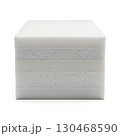 Stack of white foam blocks with varied texture 130468590
