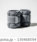 Pair of grey ankle or wrist weights for fitness 130468594