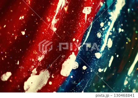 Swirling colors of red, blue, and white create an abstract display of movement and light 130468841