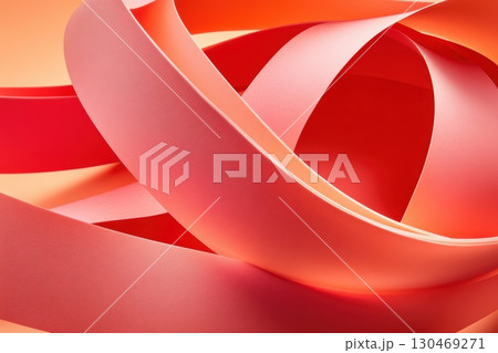 Colorful ribbons of varying shades swirl together in a creative display on a soft backdrop 130469271