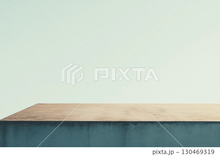 Stark contrast of a minimalist rooftop against a clear blue sky during early morning hours 130469319