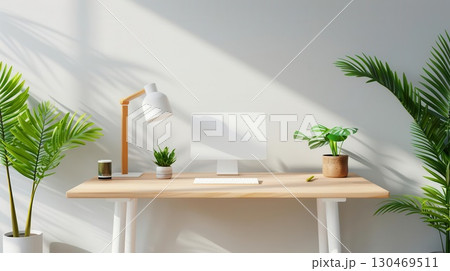 Minimalist workspace with computer, lamp, and plants on a wooden desk. Minimalist workspace with computer, lamp, and plants on a wooden desk. 130469511