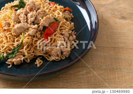 stir-fried instant noodles with basil and minced pork 130469980