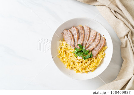 dried duck noodles in white bowl dried duck noodles in white bowl 130469987