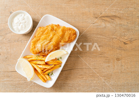 fish and chips - fried fish fillet with potatoes chips 130470016