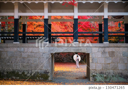 woman in kimono with autumn maple leaf, Nanzenji temple, Kyoto woman in kimono with autumn maple leaf, Nanzenji temple, Kyoto 130471265