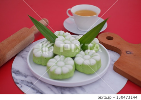 Delicious Kue Putu Ayu Indonesian Coconut Cakes with Tea 130473144