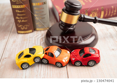 Bangkok, Thailand March 15, 2024 Car accident lawsuit and insurance, Judge hammer and money with car model. Bangkok, Thailand March 15, 2024 Car accident lawsuit and insurance, Judge hammer and money with car model. 130474041