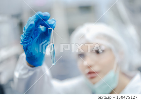 Industry inspector team working, QC staff work checking machine operation for safety and hygiene in drink factory 130475127