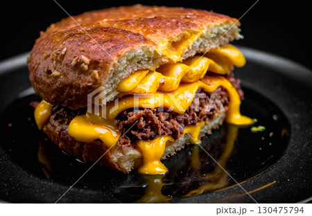 The Macro photo of tortas on black glossy pla 130475794