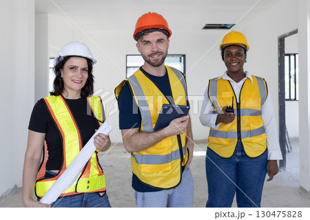 Group of Construction workers, Portrait Construction Engineer team standing together happy smiling 130475828