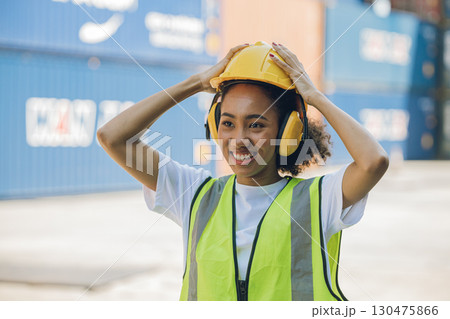 Women work container port, Customs at container yard manage,Cargo Import Export. Logistics industry. Women work container port, Customs at container yard manage,Cargo Import Export. Logistics industry. 130475866
