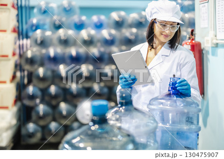 Drinking water factory auditor quality assurance inspector, Quality control staff working audit 130475907