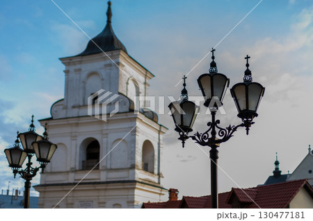 Historic church building with domed roof against clear blue sky in a vibrant town Historic church building with domed roof against clear blue sky in a vibrant town 130477181