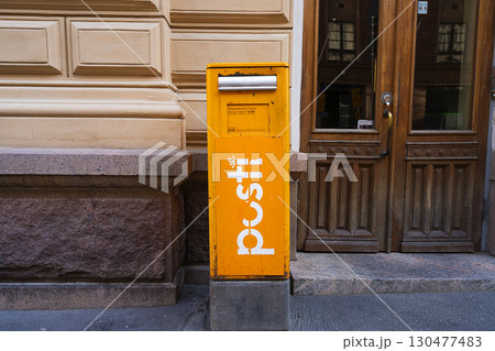 Finnish postal mailbox in Helsinki, Finland 130477483
