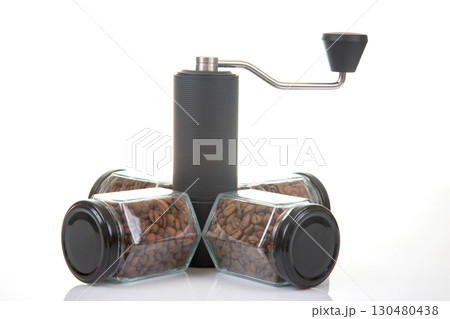 black manual coffee grinder for coffee beans and four glass transparent jars  130480438
