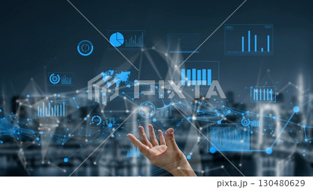 Futuristic Data Visualization Concept with Hand Reaching Out Towards Digital Charts and Graphs Against a Cityscape Background xenic Futuristic Data Visualization Concept with Hand Reaching Out Towards Digital Charts and Graphs Against a Cityscape Background xenic 130480629