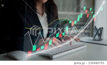 Business professional analyzing financial charts on a modern computer, with a graphical representation of stock market trends on display, showing data analysis Copula Business professional analyzing financial charts on a modern computer, with a graphical representation of stock market trends on display, showing data analysis Copula 130480793