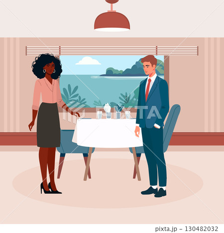 Business meeting between African American woman and Caucasian man in elegant restaurant setting 130482032