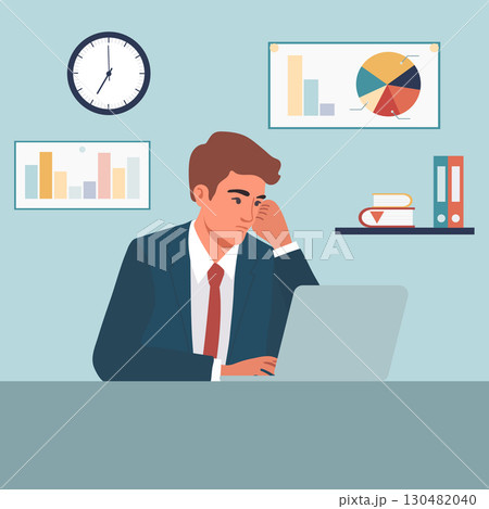 Businessman in office analyzing data charts on laptop, concept of stress and productivity 130482040