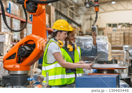 robotic engineer training, technician work in factory industry robot welding arm machine control robotic engineer training, technician work in factory industry robot welding arm machine control 130483448
