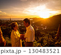 Elderly couple embraced happily smiling in front of beautiful landscape. 130483521