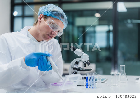 Scientist working in science lab. Medical lab people, Pharmaceutical medicine research laboratory. Scientist working in science lab. Medical lab people, Pharmaceutical medicine research laboratory. 130483625