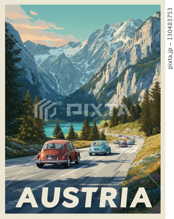 Classic cars travel along a winding road in the Austrian mountains. Lush greenery and towering peaks surround a serene lake under a pastel sky during late afternoon. 130483753