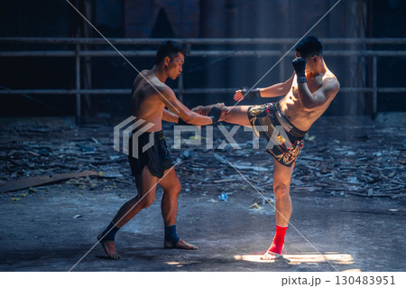 Thai boxing, Muay thai fighter boxer action in kick boxing in ruin building ,Asian martial arts 130483951