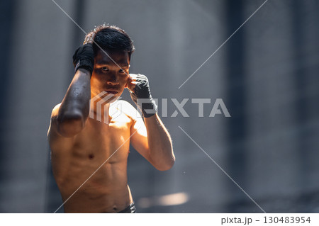 Thai boxing, Portrait muay thai fighter, Young man boxer, kick boxing male ,Asian martial arts Thai boxing, Portrait muay thai fighter, Young man boxer, kick boxing male ,Asian martial arts 130483954