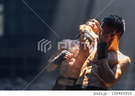 Thai boxing, Muay thai fighter boxer action in kick boxing in ruin building ,Asian martial arts 130483959