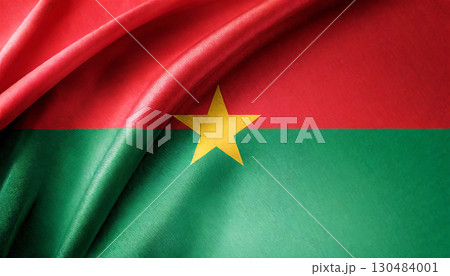 Folded flag of Burkina Faso with visible satin texture 130484001
