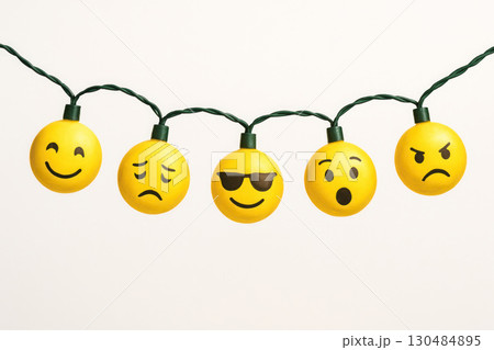 Garland of yellow emoticons with emotions. Garland of yellow emoticons with emotions. 130484895