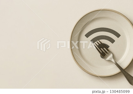 A plate with a Wi-Fi symbol and a plug. Space for text. 130485099
