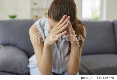 Worried young woman feeling sad and frustrated because of work or relationship problems. 130486770