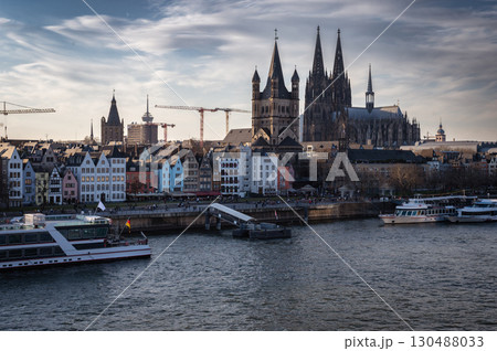 Cologne, Germany - March 7 2025: City skyline in spring along the Rhine river Cologne, Germany - March 7 2025: City skyline in spring along the Rhine river 130488033