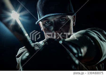 Baseball player in action on the field during a baseball game. generative ai Baseball player in action on the field during a baseball game. generative ai 130488075